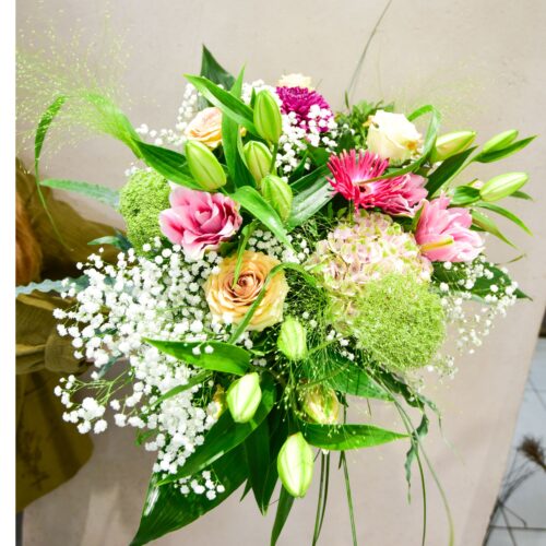 Bouquet rond de coloré ou pastel coloré suivant l'arrivage du fleuriste